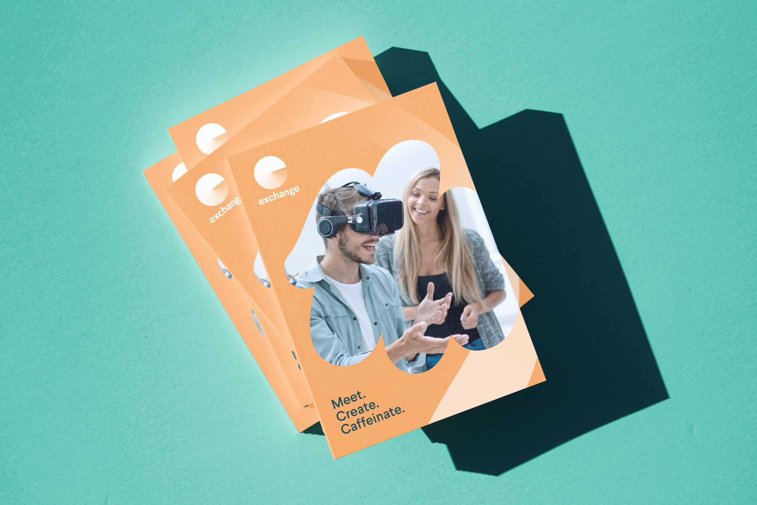 The Exchange publication cover, showing a guy with goggles on, interacting in the Metaverse.