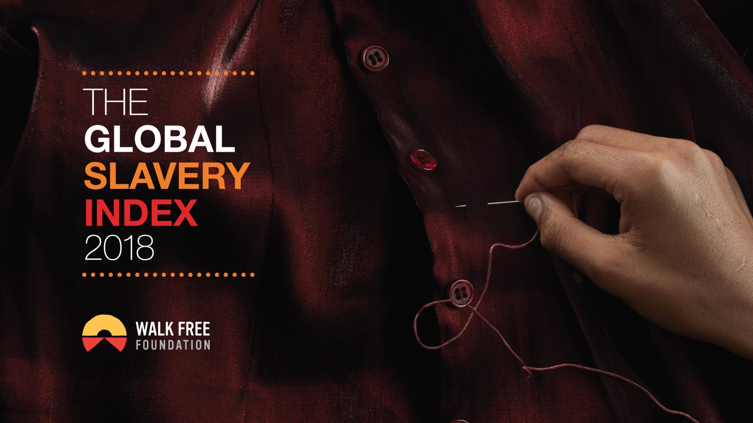 A hand sewing a red shirt in the background with the copy: 'The Global Slavery Index 2018.'