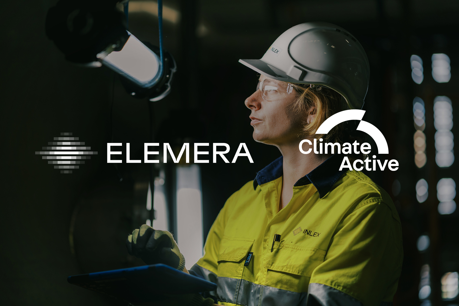 Elemera logo and Climate Active logo over a photo of a female engineer in high vis in a workshop.